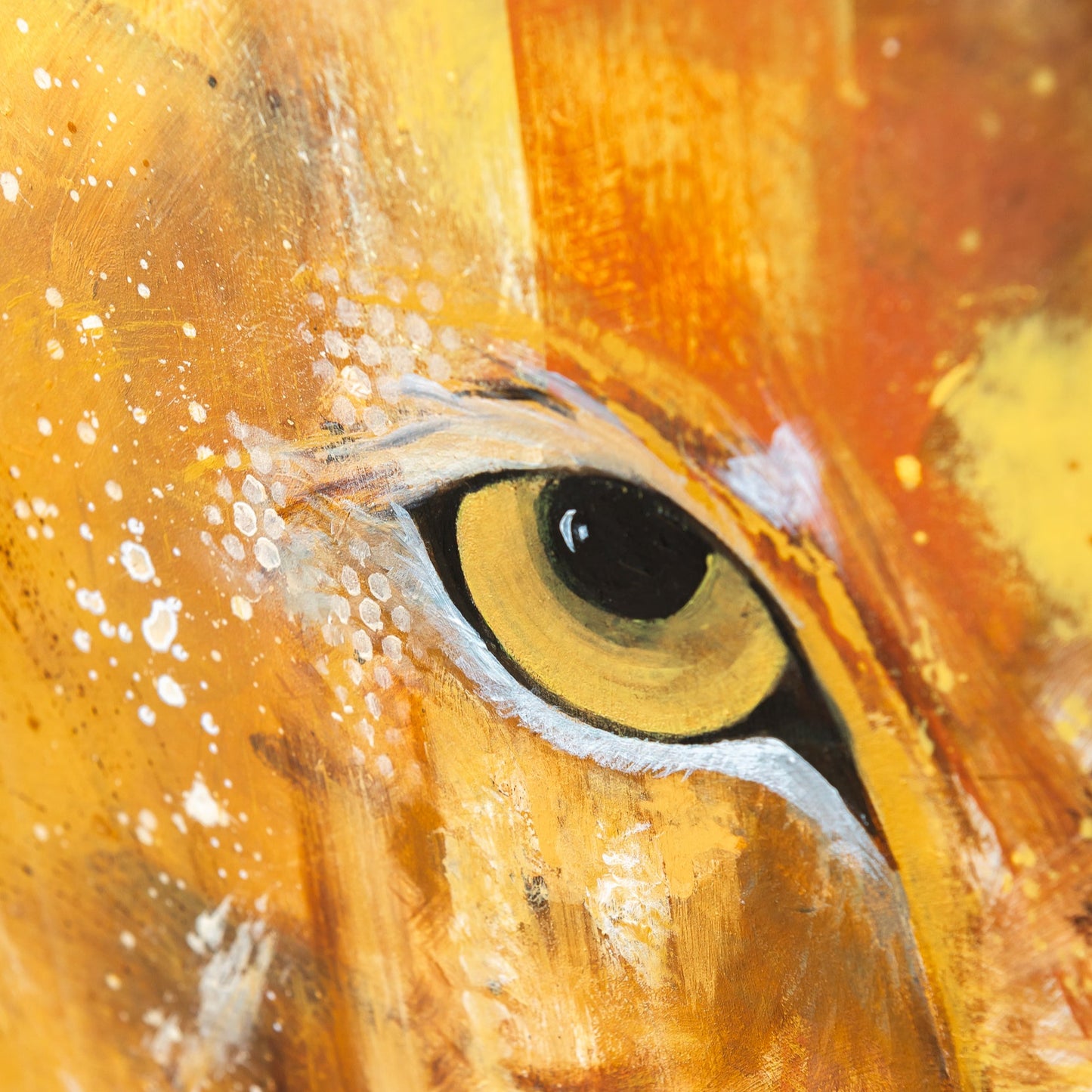 yellow Lion eye with white dots